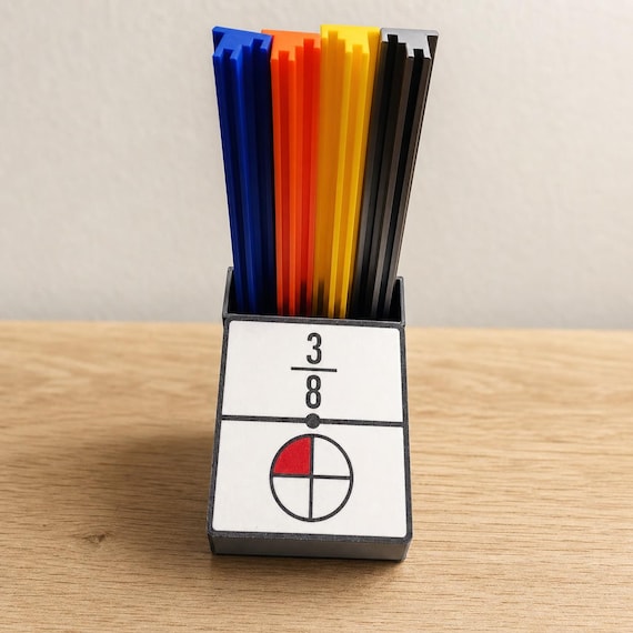 Advanced EqualLink storage box showing three eighths with four blue, orange, yellow, and black racks on a pale wood table.