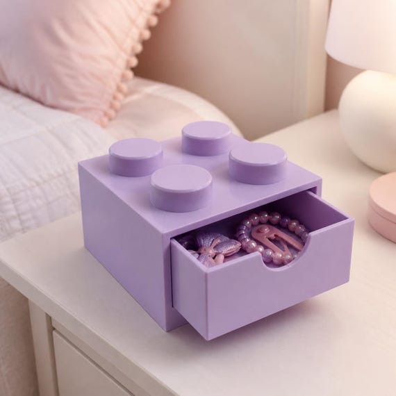 Lilac purple 2x2 storage drawer on a bedside table