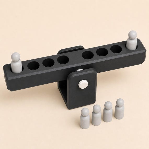 High overhead detail of the charcoal BalanceBridge showing all eight beam positions and six equal peg weights.