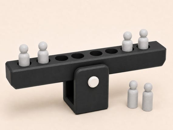 Graphite Lab lever activity with charcoal stand, gray peg weights, eight beam slots, and ivory pivot hardware.