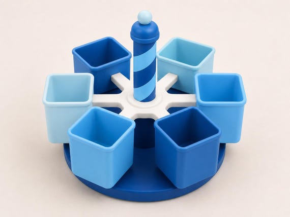 Cool Focus rotating classroom organizer with six coordinated blue cups around a dark blue base.