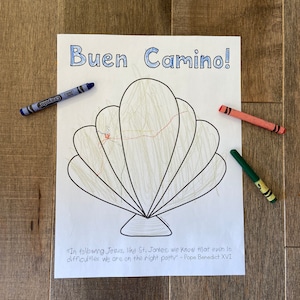 May include: A black and white printable coloring page with a seashell design. The page has the text "Buen Camino!" at the top and a quote from Pope Benedict XVI at the bottom: "In following Jesus, like St. James, we know that even in difficulties we are on the right path."