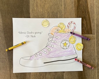 May include: A purple and white sneaker with a star on the side. The sneaker is filled with gold coins and a candy cane. The text "Mimic God's giving." - St. Nick is written on the page.