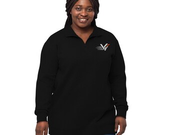 May include: A black long-sleeve quarter-zip pullover featuring a small white and orange logo on the left chest. The logo consists of a stylized letter V with horizontal motion lines extending to the left and a small orange accent mark.