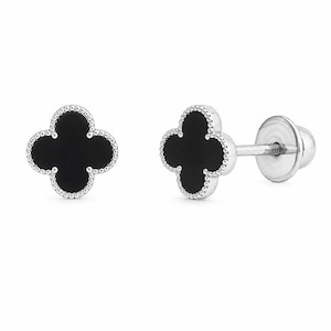 May include: A pair of stud earrings featuring a four-leaf clover shape with a smooth black inlay surrounded by a beaded silver-tone metal border. The earrings include a straight post and a circular screw-back closure mechanism for secure fastening.