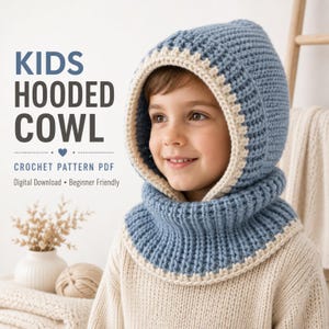 May include: A blue and cream crochet hooded cowl worn by a child. The text on the image reads: KIDS HOODED COWL, CROCHET PATTERN PDF, Digital Download, Beginner Friendly. The cowl features a ribbed texture and a cream-colored border trim.