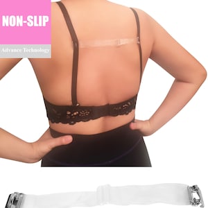 May include: Clear bra strap with a silver clasp. The strap is designed to help keep a bra from slipping off the shoulders. The strap is made of a clear, stretchy material.