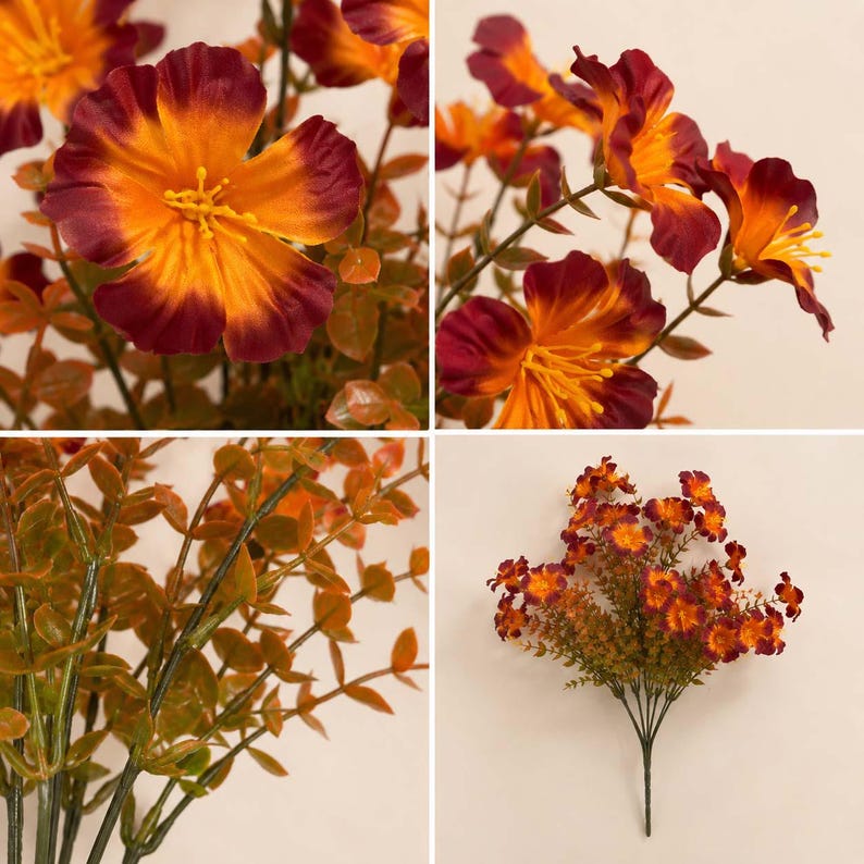 May include: A bouquet of artificial flowers featuring five-petaled blossoms with vibrant orange centers and deep burgundy edges. The stems are thin and green, accompanied by small, pointed, brownish-green leaves throughout the arrangement.