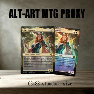 May include: Two rectangular trading cards measuring 63 by 88 millimeters, titled Hare Apparent. The cards feature a fantasy illustration of a noble rabbit character with red hair, wings, and a blue outfit, set in a forest. Text includes creature stats 2/2.