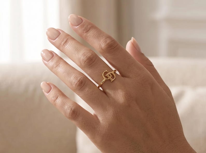 Romantic intertwined initials ring personalized with two letters, meaningful gold couple jewelry and special gift for someone you love.