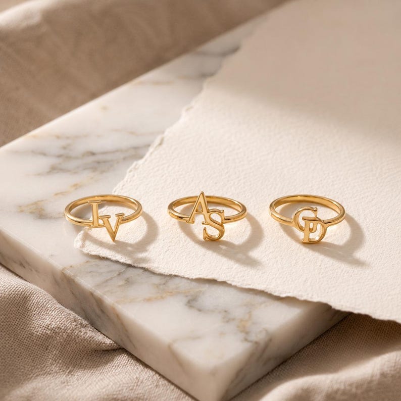 Personalized couple initial ring combining two special letters, romantic gold jewelry for couples celebrating their unique connection.