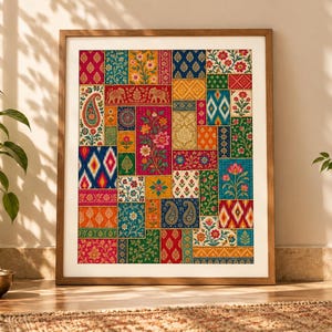 Puede incluir: Una impresión de arte mural rectangular enmarcada que presenta un vibrante collage de retazos con varios patrones intrincados, incluyendo motivos florales, diseños de cachemira, formas geométricas e ilustraciones de elefantes en tonos rojo, azul, verde y oro.