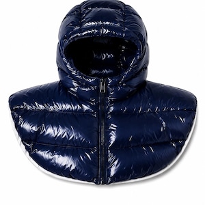 May include: A navy blue quilted puffer hood and shoulder cover with a glossy finish. The garment features horizontal baffles, a central zip closure, and a white trim along the bottom edge. The design covers the head and shoulders.