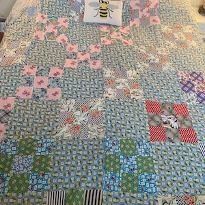 May include: A rustic wooden sign with the text "Welcome to our home" in white lettering. The sign features a distressed finish and a simple, inviting design, perfect for a front porch or entryway.