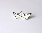 White plastic paper boat brooch