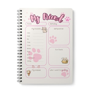 Può includere: Un quaderno a spirale con copertina bianca decorata con impronte di zampe rosa e illustrazioni di gatti. La pagina include sezioni intitolate My Friend, Name, Birthday, My Favorite, Self-portrait, Fun Facts, My hobbies e Who I want to become.