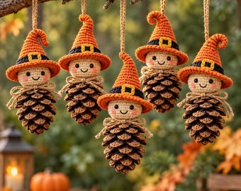 May include: Five hanging ornaments featuring crocheted figures with smiling faces and orange pointed hats with black bands and yellow buckles. Each figure has a body made of a natural brown pinecone and is suspended by a thin jute twine loop.