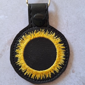 Eclipse Embroidered Vinyl Keychain