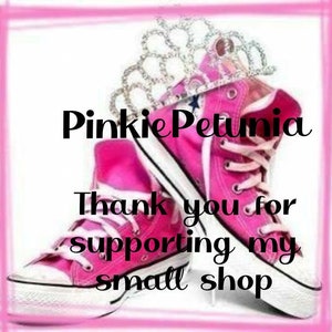 May include: Pinkie Petunia, a small shop, is thanking customers for their support. The image features a pair of pink high-top sneakers with a white sole and a sparkly crown on top.