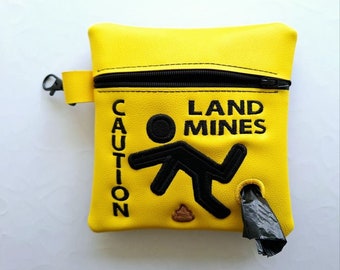 Caution - Land Mines - Embroidered vinyl pouch for Dog waste bags - with clip to hook on leash - Includes roll of Bags