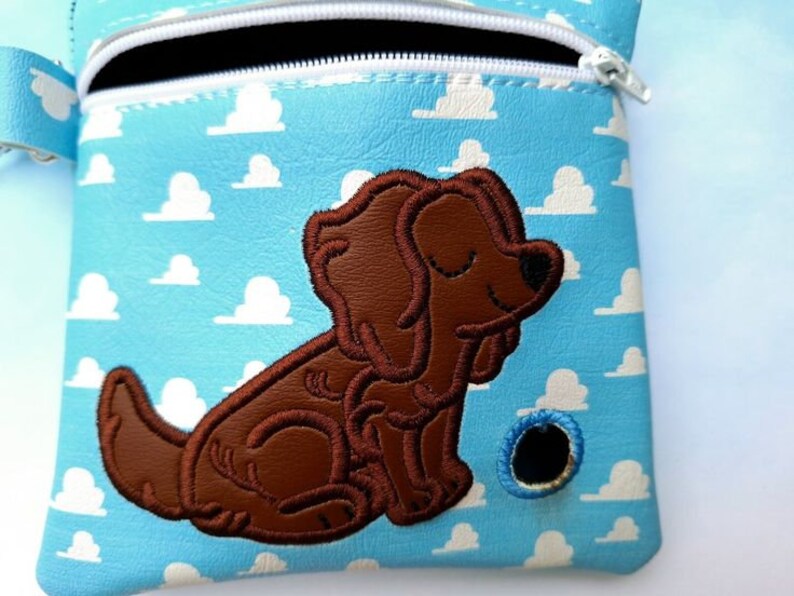 Little Brown Dog and blue skies Embroidered vinyl pouch for Dog waste bags with clip to hook on leash Includes roll of Bags image 1