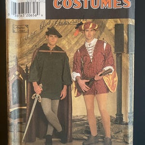 May include: Simplicity Costumes sewing pattern 7761 for sizes XS, S, M, L, XL. The envelope features two historical-style outfits: a dark green tunic with a matching cape and sword, and a red textured doublet with gold sleeves and a feathered hat.