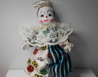 small porcelain clown dolls