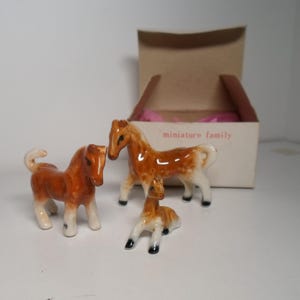 Vintage porcelain horse family , bone china horse mare and foal. Miniature in original box.