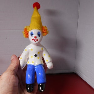 Vintage Porzellan Figur, sitzender Clown Figur.