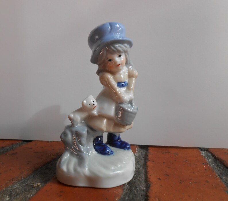 Vintage girl figurine girl with puppy figurine glazed Etsy