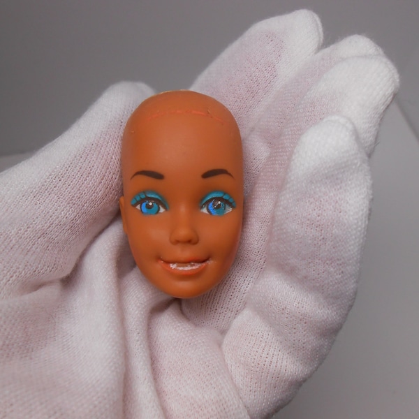 Vintage Barbie head , Barbie head marked Mattel 1976 Taiwan inside the rim. Bald Barbie Malibu head to reroot.