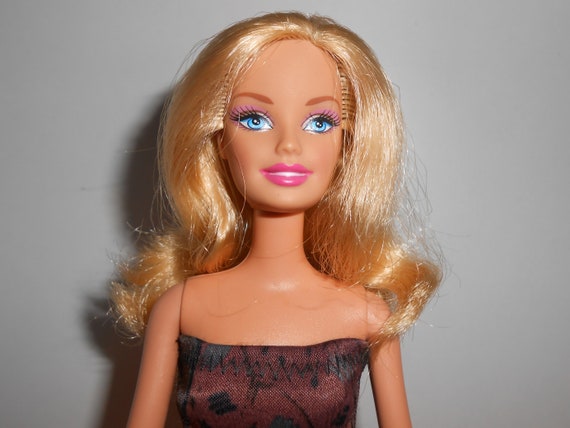 barbie dolls with bendable legs and arms
