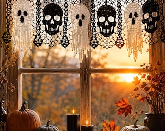 May include: A black and white crocheted window valance featuring alternating ghost and skull motifs connected by a delicate lace-like web pattern. The textile hanging displays three white ghosts and three black skulls arranged in a repeating sequence.