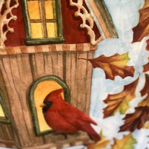 May include: Watercolor illustration of a birdhouse with a red cardinal perched in an arched opening. The birdhouse is brown and red with a decorative trim. Autumn leaves in shades of brown, yellow, and orange surround the birdhouse.