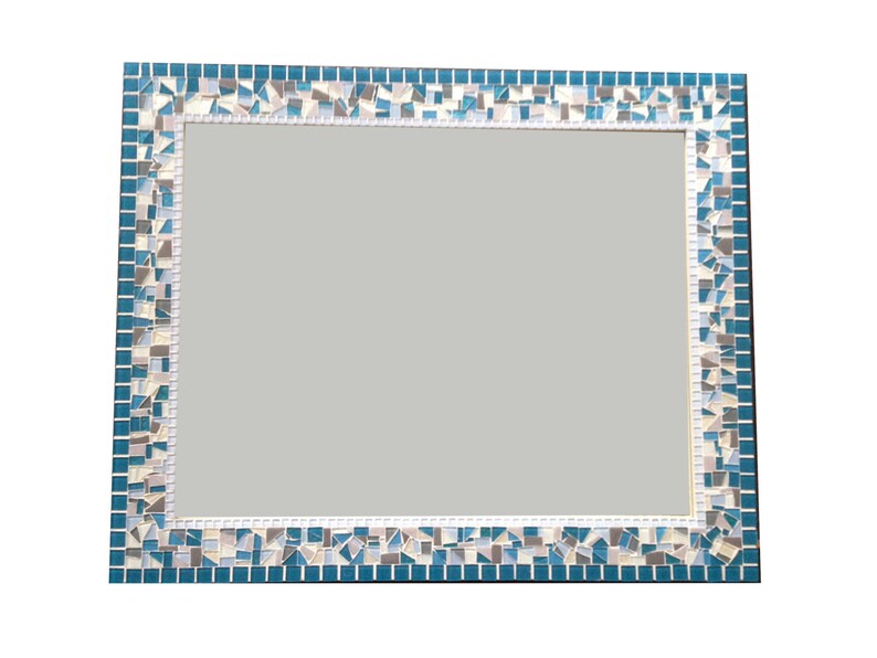 May include: A rectangular mirror with a mosaic frame. The frame is made of small, blue, white and grey tiles.