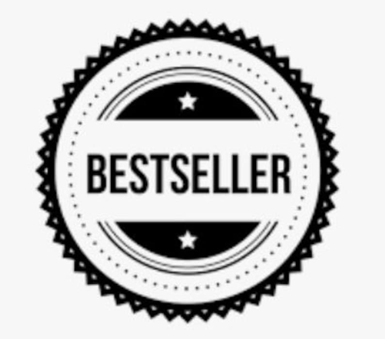 K&ouml;nnte beinhalten: Schwarzwei&szlig;grafik mit dem Wort "BESTSELLER" in einem Kreis mit zwei Sternen.