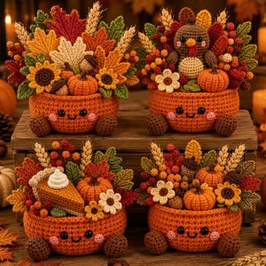 May include: Four crocheted orange bowls with smiling faces, each filled with autumn-themed decor including crocheted pumpkins, sunflowers, maple leaves, wheat stalks, berries, and one bowl featuring a slice of pumpkin pie and another a turkey.