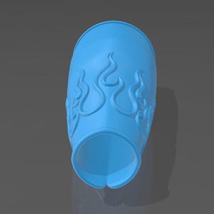 May include: A bright blue, cylindrical arm guard or bracer featuring a raised, embossed flame pattern across its surface. The object has a smooth, matte finish and a curved, open-ended design that tapers slightly towards the top and bottom edges.