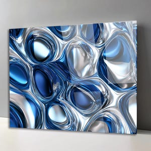 May include: A rectangular wall art piece featuring a high-gloss, abstract design of interconnected, fluid shapes in shades of deep blue, light blue, and metallic silver. The surface displays a smooth, reflective, and liquid-like texture.