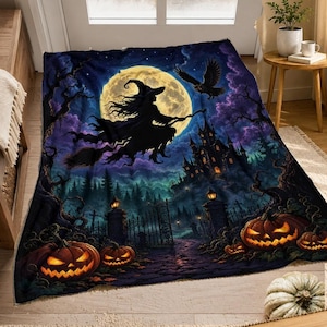 May include: A rectangular throw blanket featuring a dark, atmospheric Halloween scene with a silhouette of a witch flying on a broomstick against a large full moon, a gothic castle, a flying raven, and glowing jack-o'-lanterns in the foreground.