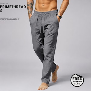 May include: Grey trousers featuring an elastic waistband with a drawstring closure, side pockets, and a straight-leg cut. The fabric has a visible texture. Text in the upper left corner reads CREATED FOR PRIMETHREADS and includes an address.