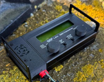 A kit to add amplified speaker, microphone, and push to talk to your QMX by N7TRX
