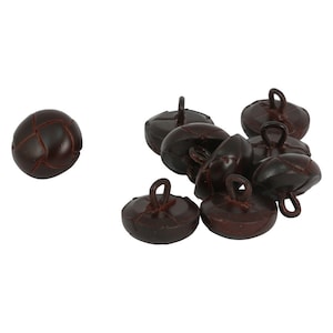 May include: Eight brown leather buttons with a loop on the top. The buttons have a stitched design.