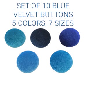 May include: A set of ten blue velvet buttons in five different shades of blue. The buttons are round and made of a soft, textured material. The text at the top reads "SET OF 10 BLUE VELVET BUTTONS 5 COLORS, 7 SIZES."
