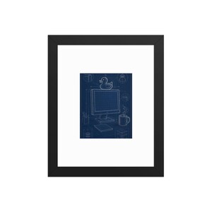 May include: A framed print featuring a blue and white technical blueprint illustration of a computer monitor with a rubber duck on top, a steaming mug, and a notepad, set against a grid background with various technical detail callouts.