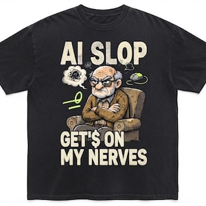 May include: A black short-sleeved t-shirt featuring a graphic of an elderly person sitting in a chair with arms crossed. The text reads AI SLOP GET'S ON MY NERVES. The design includes a thought bubble, a computer mouse, and a green squiggle.