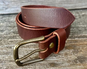 Brown leather belt with solid brass buckle. Polished, antiqued or nickel.