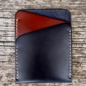Cartera de cuero delgada en mezcla de dos tonos y colores a juego