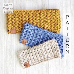 May include: Three crocheted headbands in different colors: mustard yellow, light blue, and beige. Each headband has a brown leather tag with the text "Kathy's Crochet Closet".