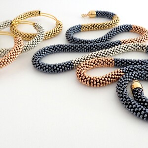 Bracciali Rigidi Donna | Oro, Argento e Oro Rosa | Pandora